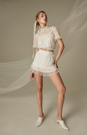 SK009WHHL24_white lace ruffle mini skirt