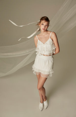 SK009WHHL24_white lace ruffle mini skirt